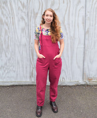 Woman wearing the Lazy Day Dungas sewing pattern from Stitched in Wonderland on The Fold Line. A dungaree pattern made in cotton poplin, denim, corduroy, linen or canvas fabrics, featuring adjustable shoulder straps, chest patch pocket, front and back pat