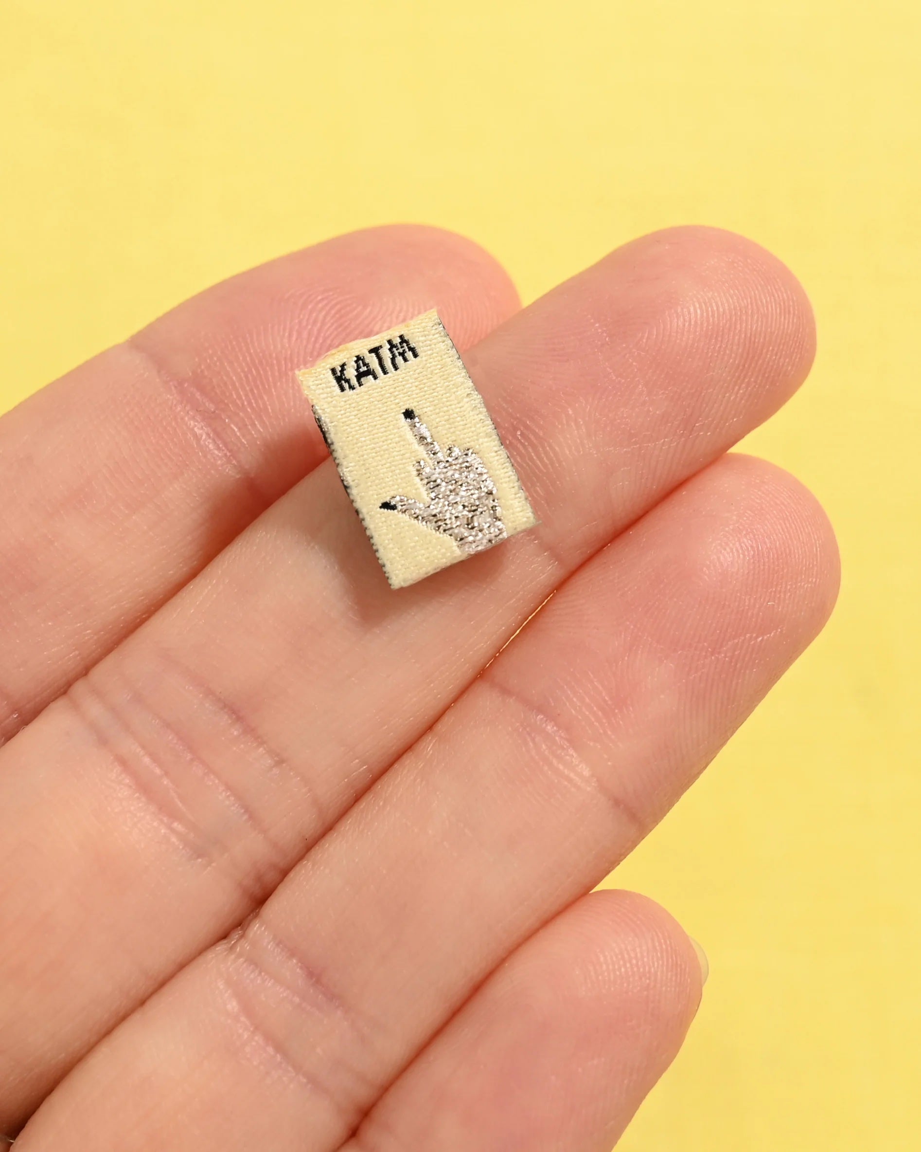 Kylie & The Machine 'Middle Finger Mini Hands' Labels