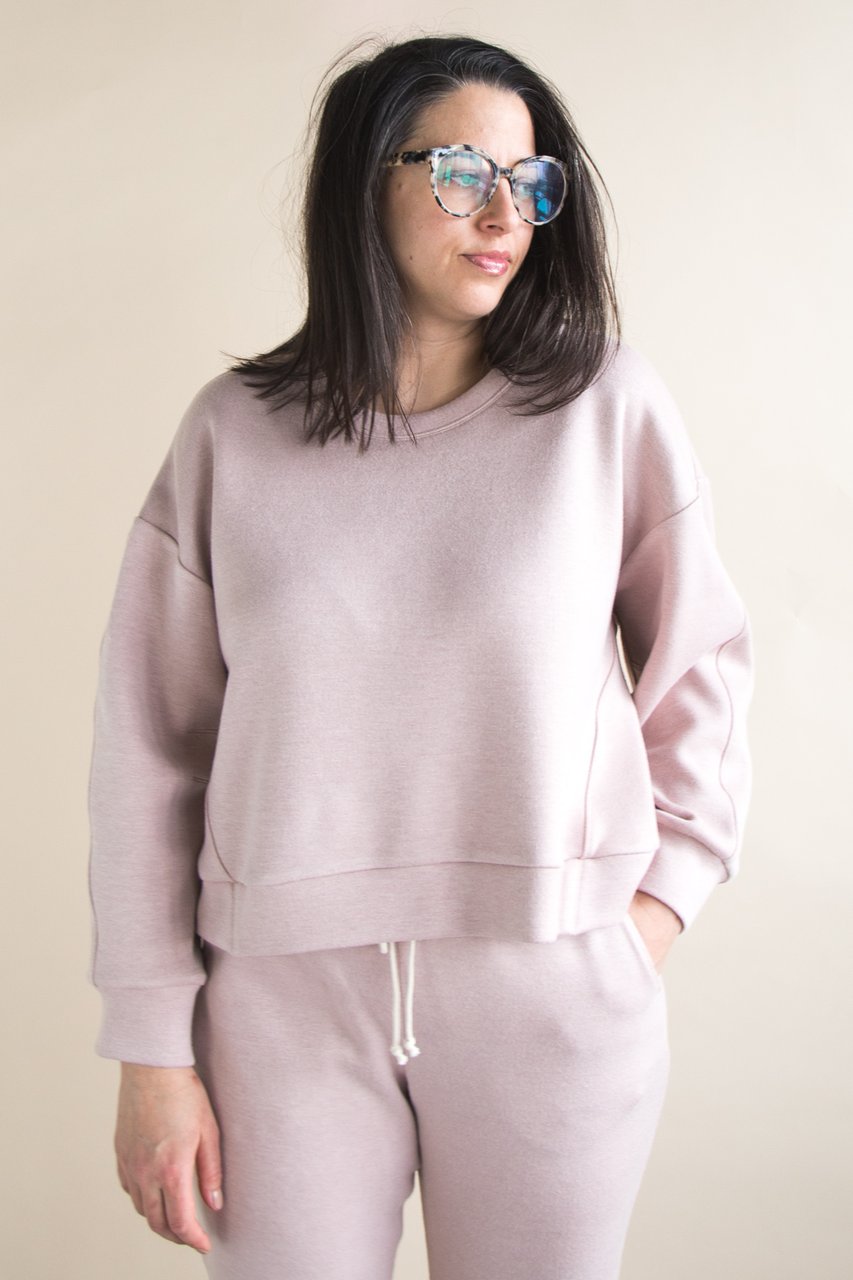 Woman wearing the Mile End Sweatshirt sewing pattern by Closet Core Patterns. A sweatshirt pattern made in cotton fleece, polar fleece, French terry, ponte and double knit fabric with at least 15% crosswise stretch, featuring an oversized fit, crew neckli