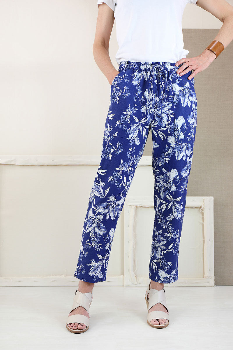 Woman wearing the Montauk Trousers sewing pattern from Liesl + Co on The Fold Line. A trouser pattern made in quilting cotton, linen, and wool suiting fabrics, featuring a semi-fit, pull-on style, elasticated waist with drawstring, front pockets, and back