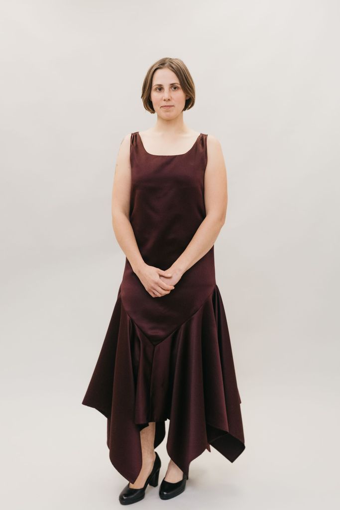 Woman wearing the 264 Monte Carlo Dress sewing pattern from Folkwear on The Fold Line. A sleeveless, flapper styled, sheath dress pattern made in lightweight and/or sheer silk, rayon, polyester, novelty velvets and jacquard fabrics, featuring straight sid