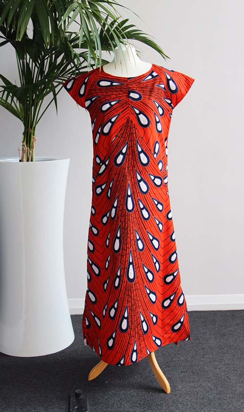 Photo showing the Moon Pocket Maxi Dress sewing pattern from Sew Different on The Fold Line. An A-line dress pattern made in lightweight cotton, linen, viscose, silk, cupro or light jersey fabrics, featuring raglan cap sleeves, pockets, round neck and bot