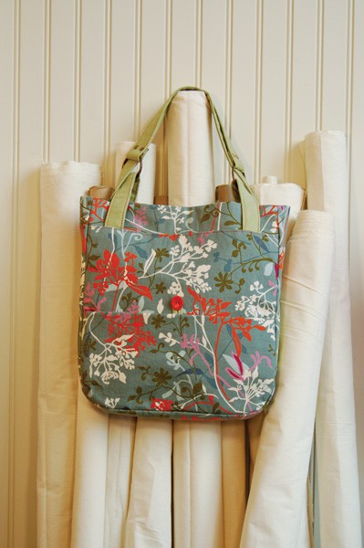 Photo showing the Day in the Park Backpack/Tote sewing pattern from Liesl + Co on The Fold Line. A bag pattern made in upholstery fabric, cotton home decorating fabric, quilting cottons, linen, or wool fabrics, featuring a fully lined interior, including 