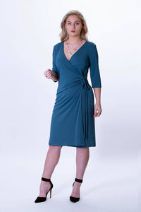 Women wearing the Orion Jersey Wrap Dress sewing pattern from The Pattern Cutters on The Fold Line. A wrap dress pattern made in stretch jersey lycra fabrics, featuring a low V-neck, ¾ length sleeves, knee length finish and a left sided gathered waist tie