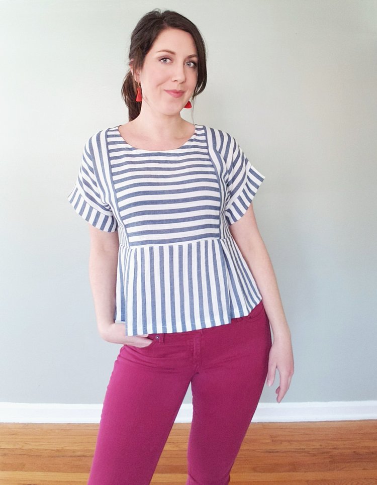 Women wearing the Fern Top sewing pattern from Pattern Scout on The Fold Line. A top pattern made in light to mid-weight woven fabrics, featuring a boxy silhouette, dolman-style short sleeves with cuffs and a sectioned bodice with a pleated peplum skirt.