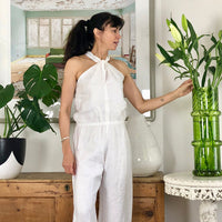 Woman wearing the Phoebe Freebie Jumpsuit sewing pattern from Pattern Union on The Fold Line. A jumpsuit pattern made in tencel, linen, crepe, rayon, cotton, or ramie fabrics, featuring a relaxed fit, high or low elasticated waist, full length trousers an