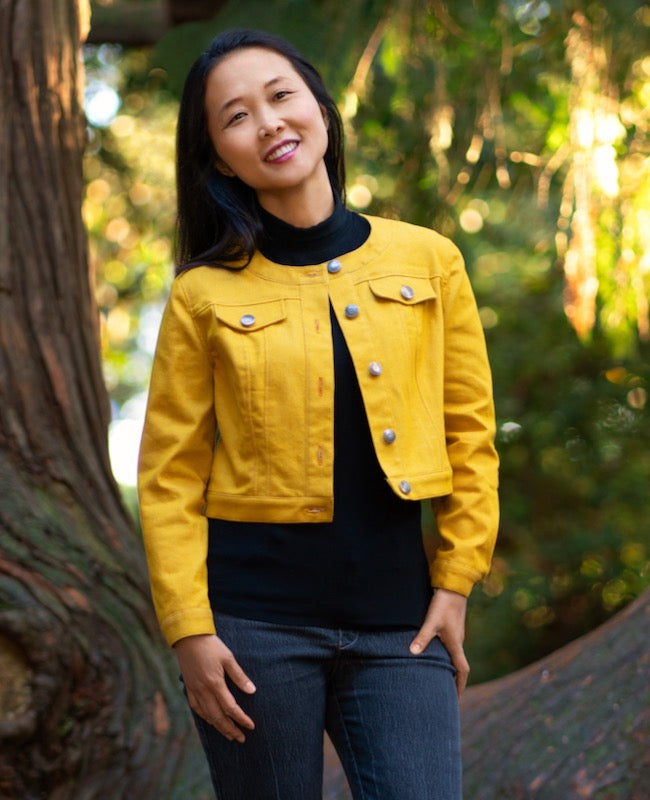 Women wearing the Poas Jacket sewing pattern from Itch to Stitch on The Fold Line. A jacket pattern made in denim, twill, broadcloth, lightweight canvas or corduroy fabrics, featuring a round neck, front button closure, cropped length, front and back yoke