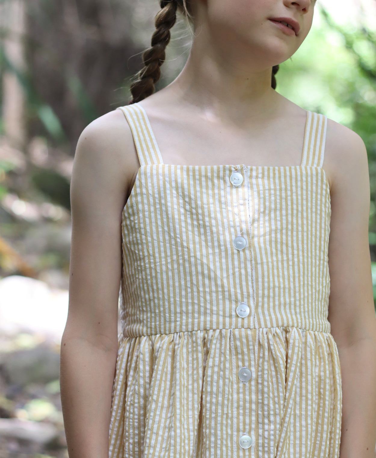 Below the Kōwhai Baby/Child/Teen Rimu Dress