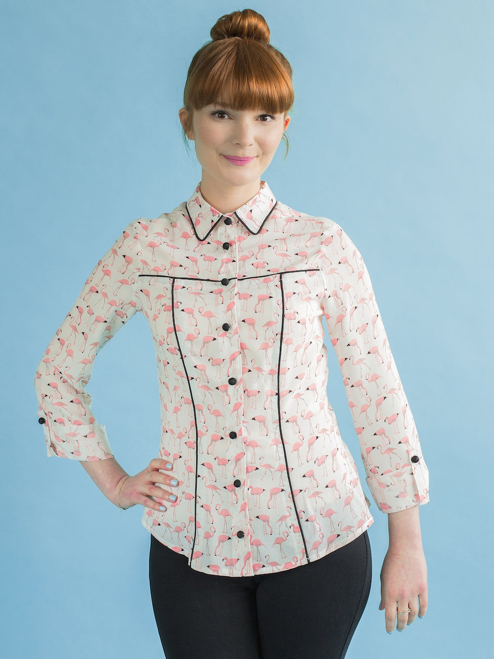 Woman wearing the Rosa Shirt sewing pattern from Tilly and the Buttons on The Fold Line. A shirt pattern made in cotton lawn, chambray, lighter weight denim, fine needlecord, double gauze, linen blends, viscose (rayon), or shirting cotton fabric, featurin