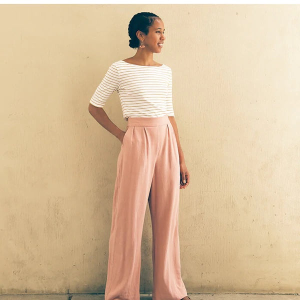 Woman wearing the Rose Pants sewing pattern from Made by Rae on The Fold Line. A trouser pattern made in tencel twill, rayon, linen-rayon blends, silk noil, loose-weave cotton or linen blends, stretch twill, cotton sateen or chambray fabrics, featuring a 