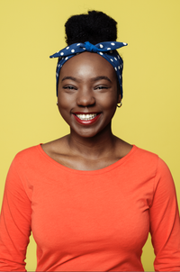 Woman wearing the Hedda Headband sewing pattern from Melilot on The Fold Line. A headband pattern made in cotton, wool, silk or rayon fabrics, featuring a reversible style, and centre knot tie.