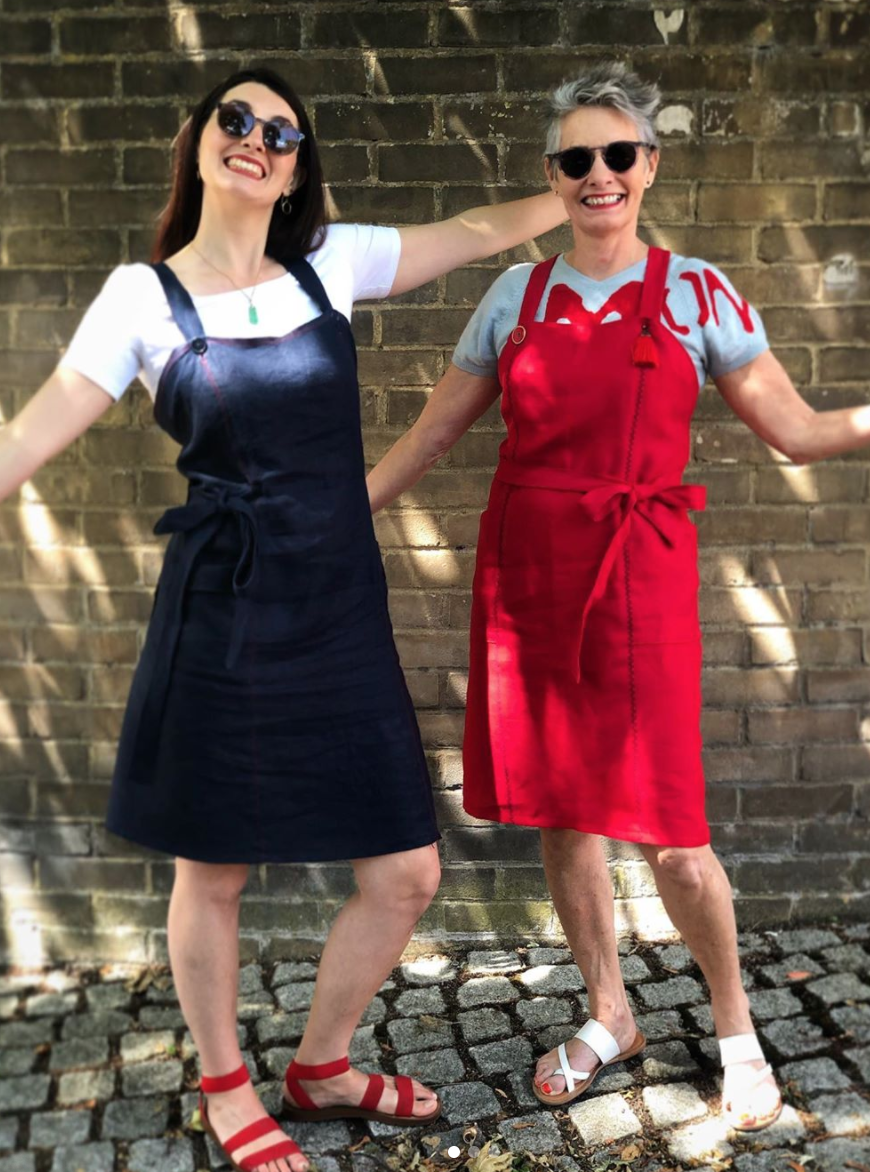 Women wearing the Adele Apron Dress sewing pattern by Alice and Co Patterns. A wrap dress pattern made in a firm fabric like denim, cotton twill or linen, lighter-weight cottons for summer and wool suiting or corduroy for winter fabrics, featuring discree