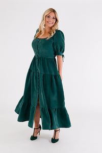 Women wearing the Shay Dress sewing pattern from Chalk and Notch on The Fold Line. A dress pattern made in rayon challis, rayon twill, rayon voile, cotton lawn, cotton voile, linen, or chambray fabrics, featuring a maxi length, wide scoop neck, fitted bod