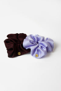 Photo showing the Silvie Scrunchie sewing pattern from JULIANA MARTEJEVS on The Fold Line. A scrunchie pattern made in linen or silk fabrics, featuring an inner elasticated gathered circular ring of fabric.