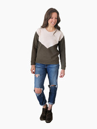 Woman wearing the Sitka Sweatshirt sewing pattern from Hey June Handmade on The Fold Line. A sweatshirt pattern made in sweatshirt fleece or French terry with spandex fabrics, featuring a cuffed sleeves and hem, crew neck, dropped shoulders, front and bac