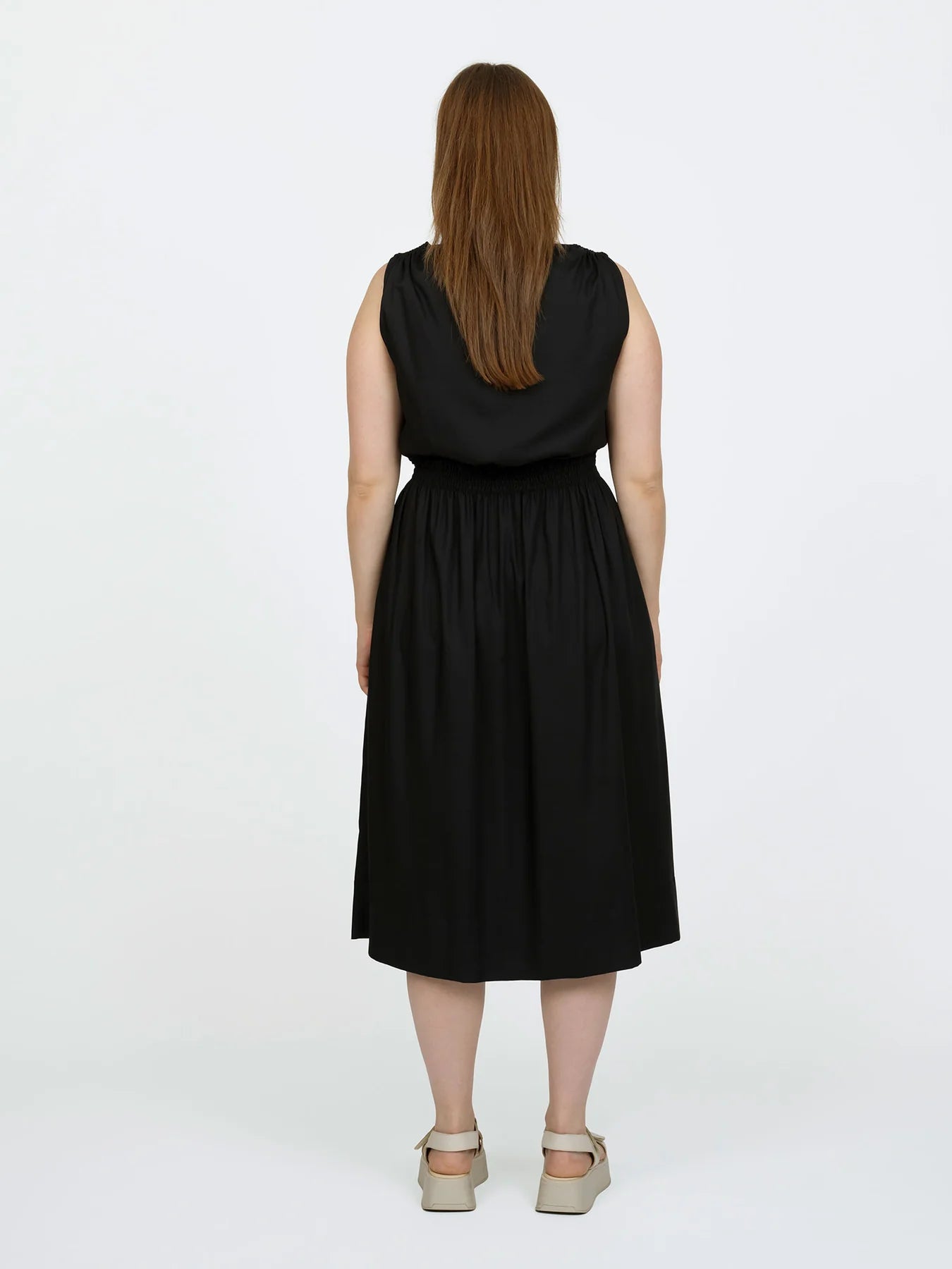 The Assembly Line Smocked Dress