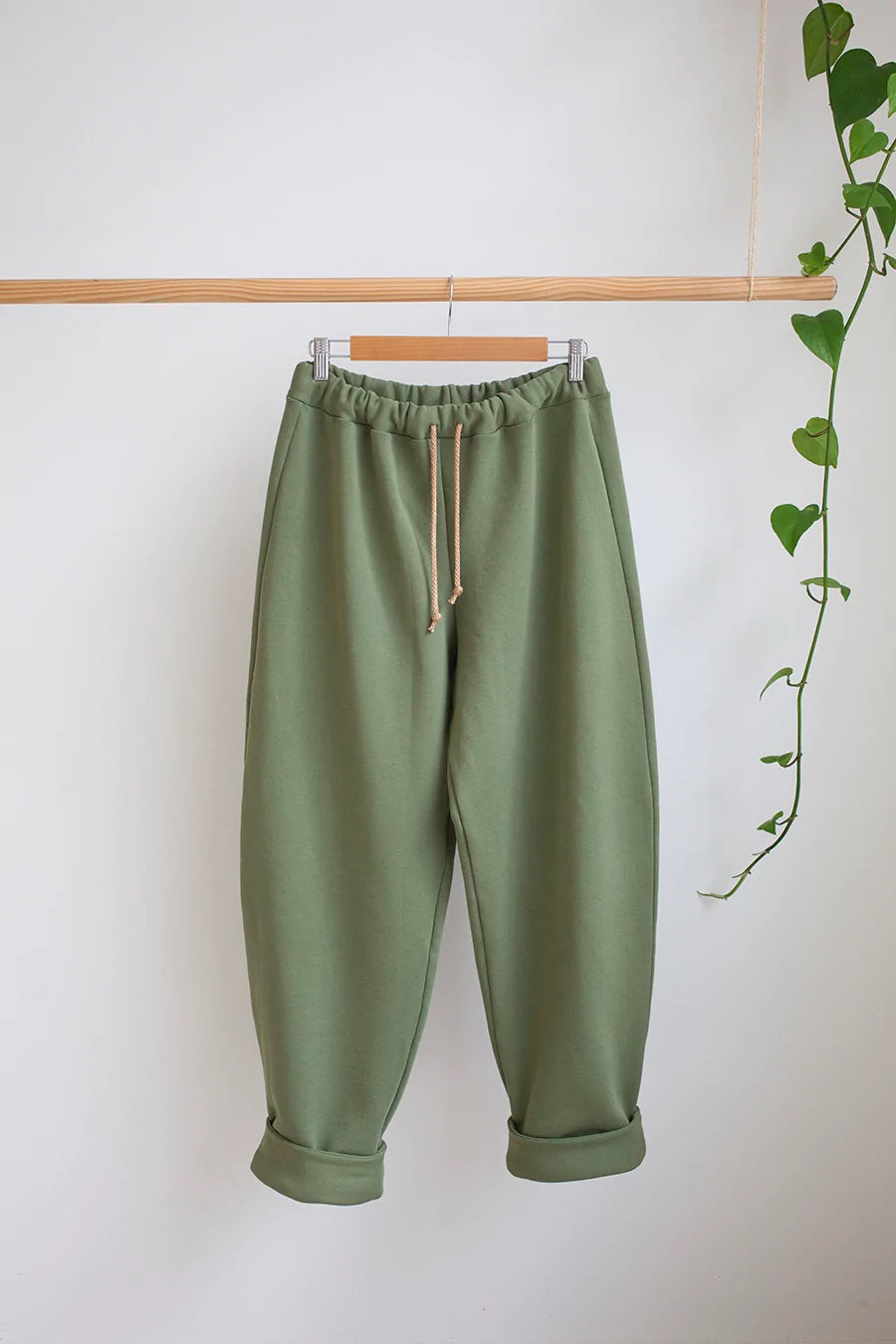 Photo showing the Sunday Trackies sewing pattern from The Modern Sewing Co on The Fold Line. A tracksuit trouser pattern made in sweatshirt fleece jersey or french terry fabrics, featuring an elasticated waist with drawstring, relaxed fit, high waisted, f