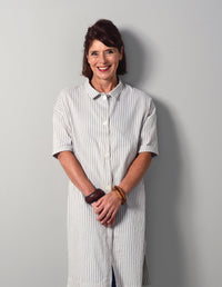 Woman wearing the Oversized Shirt Dress sewing pattern from The Maker's Atelier on The Fold Line. A shirt dress pattern made in shirting fabric, cottons, linens, babycord and brushed fabrics, featuring an oversized silhouette, front button closure, collar