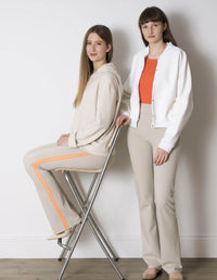 Women wearing the Pull-on Trouser sewing pattern from The Maker's Atelier on The Fold Line. A trouser pattern made in stretch fabrics with lycra or elastane, featuring a pull-on style, fit-and-flare or straight leg and elasticated waist.