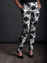 Woman wearing The City Trousers sewing pattern from The Avid Seamstress on The Fold Line. A trouser pattern made in light to medium weight slight stretch fabrics, featuring a slim fitting silhouette, side pockets, side ankle hem slit, narrow waistband and
