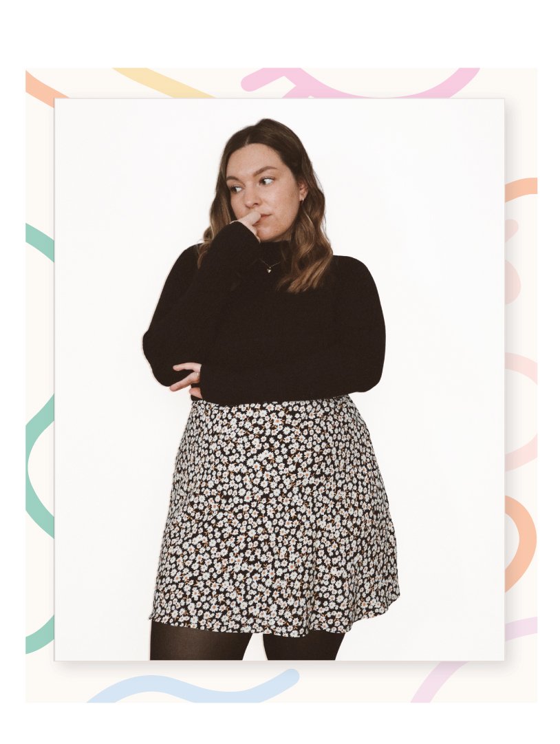 Woman wearing the Reso Mini Skirt sewing pattern from Les Perlines on The Fold Line. A skirt pattern made in silk, satin, rayon, or viscose fabric, featuring a bias cut, A-line silhouette, elastic waist, and mini length.