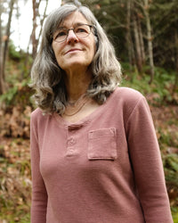 Woman wearing the Timberland Henley and Tee sewing pattern from Thread Theory on The Fold Line. A knit top pattern made in light to medium weight knit fabrics with at least 20% stretch fabrics, featuring a slim-fit, scoop neck with Henley placket, long sl