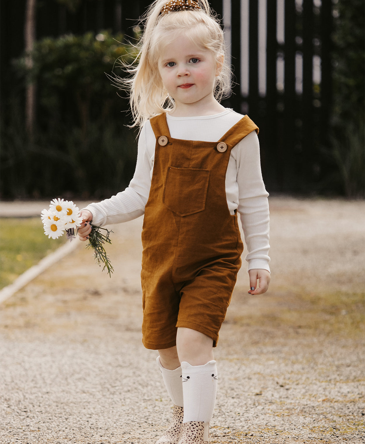 Below the Kōwhai Baby/Child Tipa Dungarees