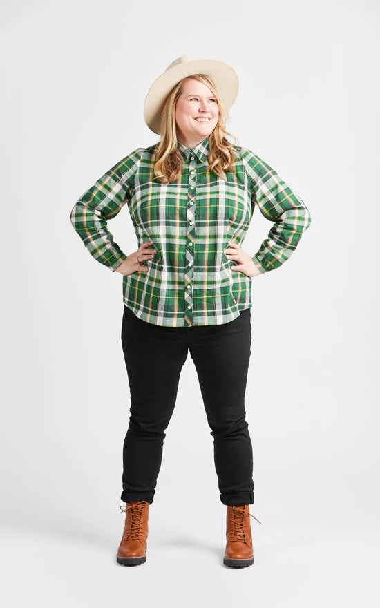 Woman wearing the Vernon Shirt sewing pattern from Cashmerette on The Fold Line. A shirt pattern made in shirting, lawn or flannel fabrics, featuring a traditional collar and collar stand, full sleeves with narrow cuffs, bust darts and front button placke