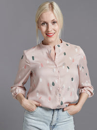 Woman wearing The Blouse sewing pattern from The Avid Seamstress on The Fold Line. A blouse pattern made in cotton, silk or viscose fabrics, featuring a stand collar, three-quarter length sleeves, relaxed fit, button placket and elasticated cuffs.