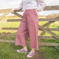 Woman wearing the Winnie Culottes sewing pattern from Sew Me Something on The Fold Line. A culottes pattern made in mid-weight cotton, light to mid-weight denim, needlecord, linen, tencel, lightweight wool suiting, viscose or viscose crepe fabrics, featur