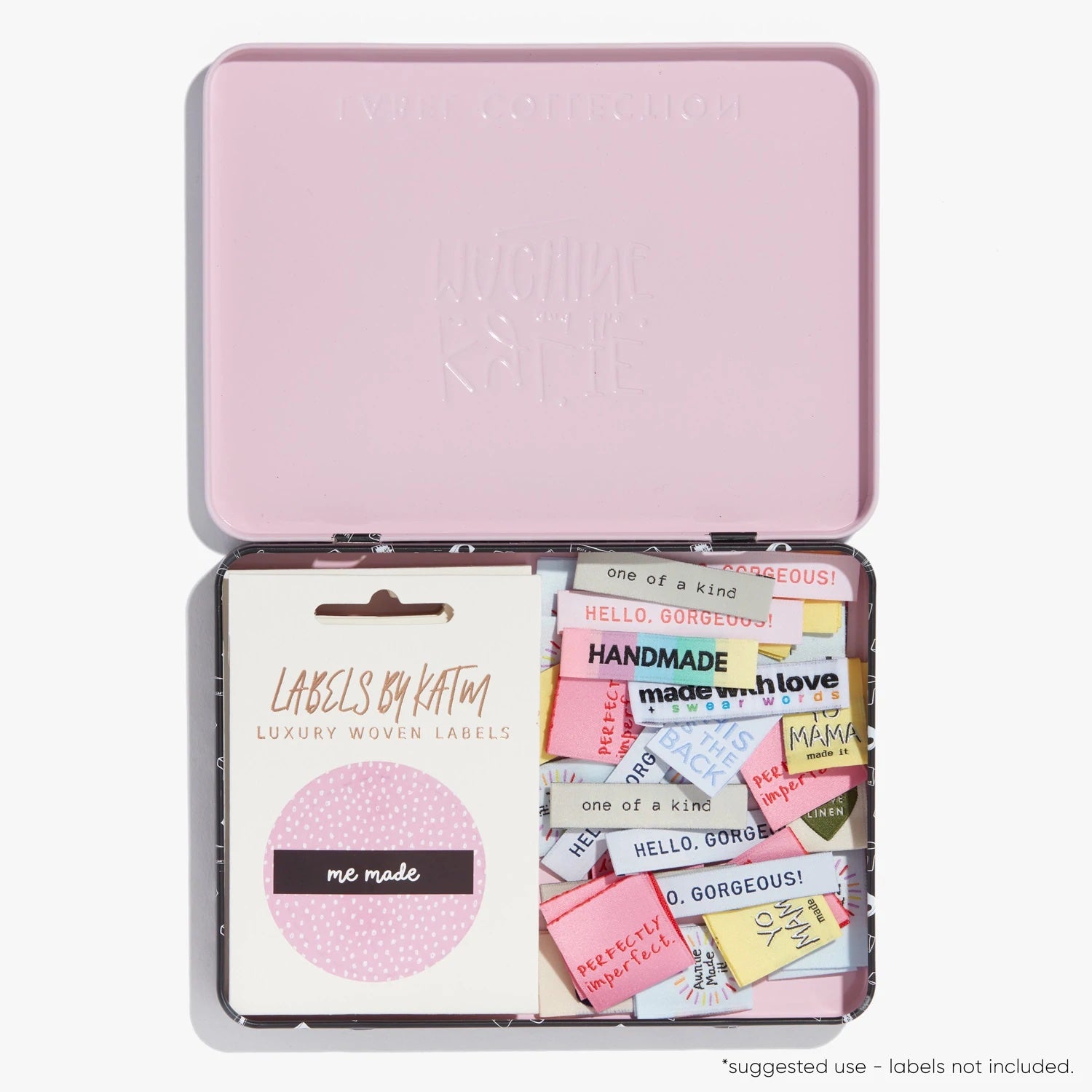 Photo showing the Label Collector's Tin from Kylie & The Machine on The Fold Line. The tin holds approximately 10 packs of Kylie & The Machine labels in their cardboard pouches or hundreds of loose labels.