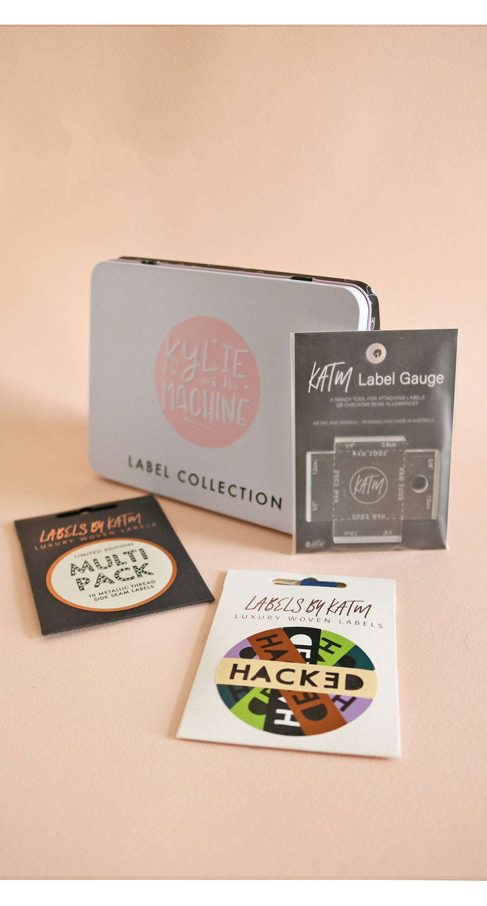 Photo showing the Gift Set Rainbow Bundle from Kylie & The Machine on The Fold Line. Kylie & The Machine make beautiful labels to sew into your handmade clothes. This bundle includes two sets of labels (Hacked and Metallic Multi Pack), collectors tin and 