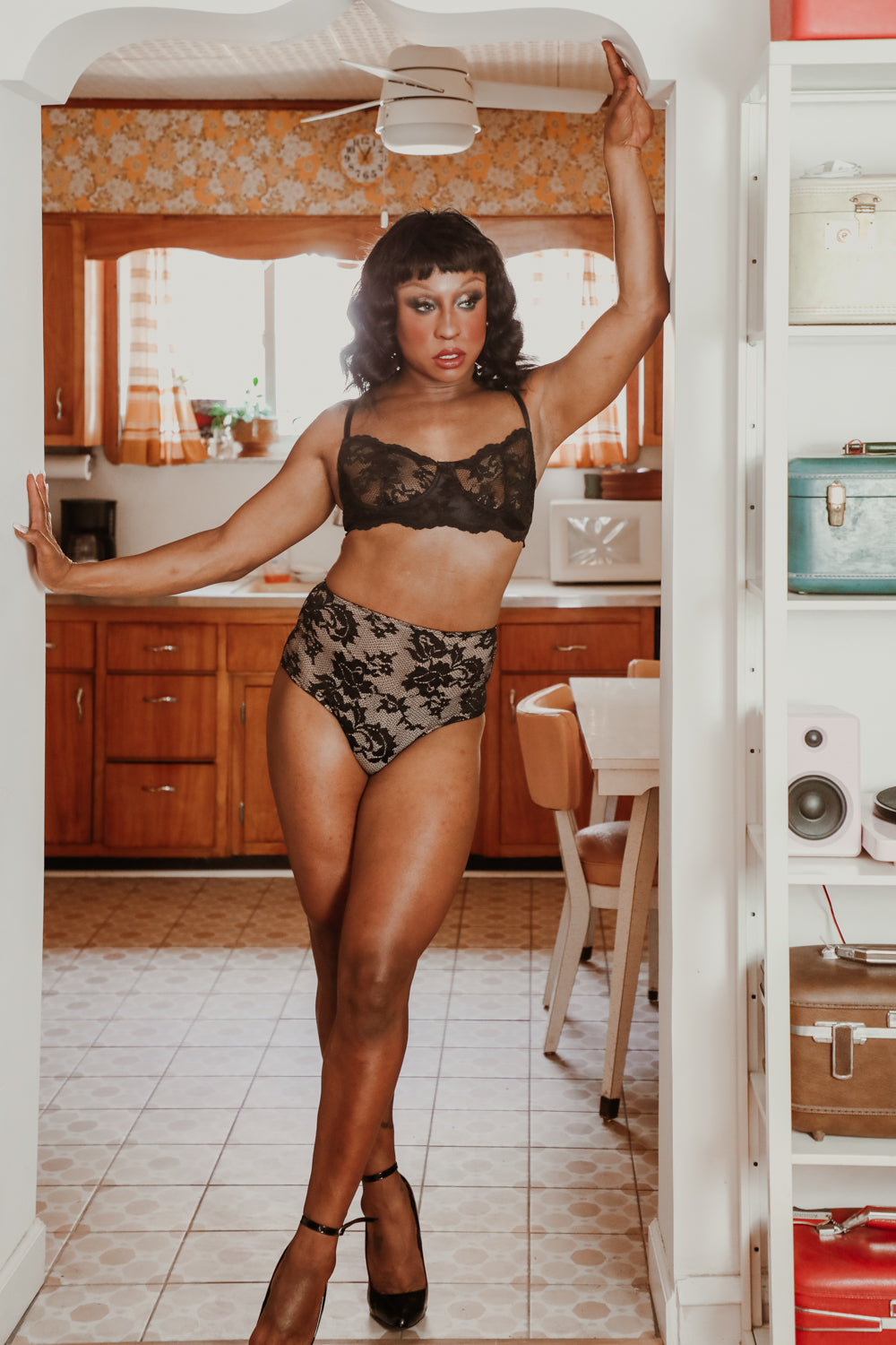 Model wearing the Adrian Transgender Bra and Panty sewing pattern from Madalynne on The Fold Line. A transgender bra and panty pattern made in 8 – 20% spandex fabrics, featuring a bra with a full band, underwire, scalloped lace edges on the upper cups, ho