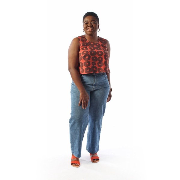 Woman wearing the Ashton Top sewing pattern by Helens Closet. A sleeveless top pattern made in cotton, linen, silk or tencel fabric featuring an A-line shape, bust darts and round neck.