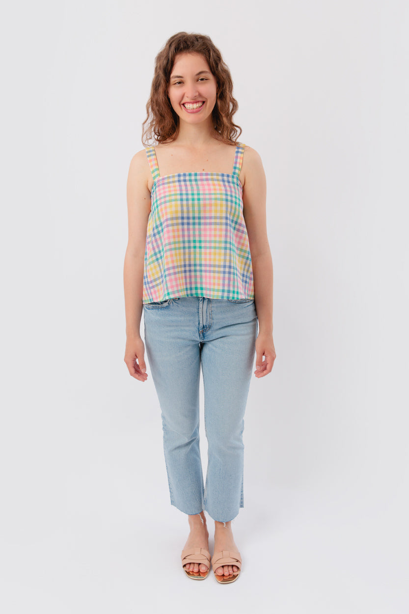 Woman wearing the Riley Top sewing pattern from Sew Love Patterns on The Fold Line. A top pattern made in cotton, viscose, tencel, crepe, rayon and bamboo silk fabrics, featuring narrow shoulder straps, boxy fit, and straight neckline with elasticated bac
