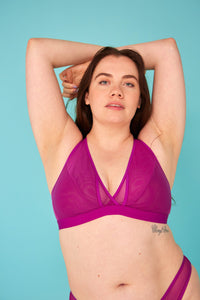 Woman wearing the Wren Bra sewing pattern from The New Craft House on The Fold Line. A bra pattern made in stretch mesh, cotton jersey, lingerie jersey and lace fabrics, featuring a soft cup, crossover front, extra front panel in larger sizes, underband, 