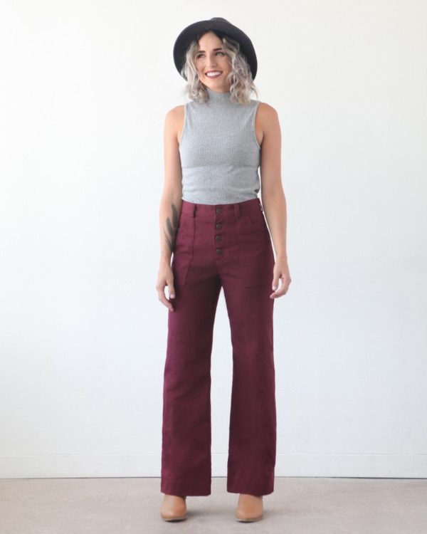 Woman wearing the Lander Pant sewing pattern by True Bias. A trouser pattern made in twill, linen, corduroy or denim fabric featuring a high waist, button fly, front and back patch pockets and a straight fit through the leg.
