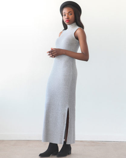 Woman wearing the Nikko Dress sewing pattern by True Bias. A dress pattern made in rib knit, sweater knit, bamboo knit or stretch velvet fabric featuring a mock turtleneck, sleeveless but cut to resemble a racerback, but with enough coverage to wear a regular bra.