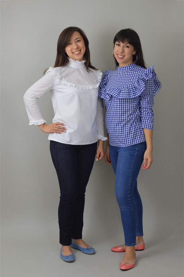 Women wearing the Bloomsbury Blouse sewing pattern from Nina Lee on The Fold Line. A blouse pattern made in cotton lawn, velvet or dupion silk fabrics, featuring a high collar, yoked bodice with broad or narrow ruffles, button-back fastening, bracelet-length sleeves.