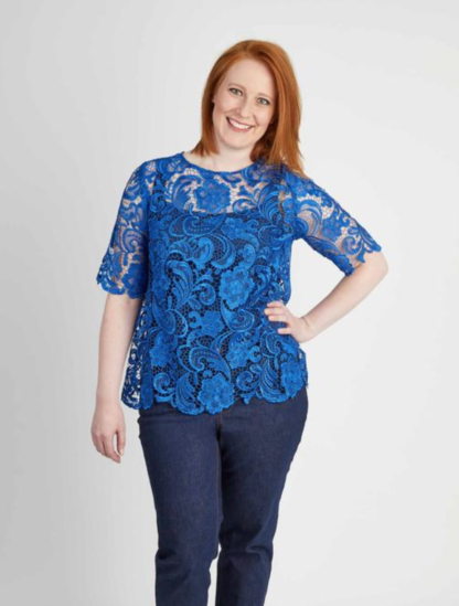 Woman wearing the Montrose Top sewing pattern by Cashmerette. A top pattern made in silk, lawn, voile or lace fabric featuring a jewel neck, elbow length sleeves and keyhole back closure.