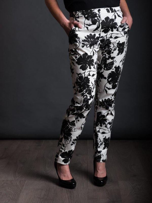 Woman wearing The City Trousers sewing pattern from The Avid Seamstress on The Fold Line. A trouser pattern made in light to medium weight slight stretch fabrics, featuring a slim fitting silhouette, side pockets, side ankle hem slit, narrow waistband and invisible back zip closure.