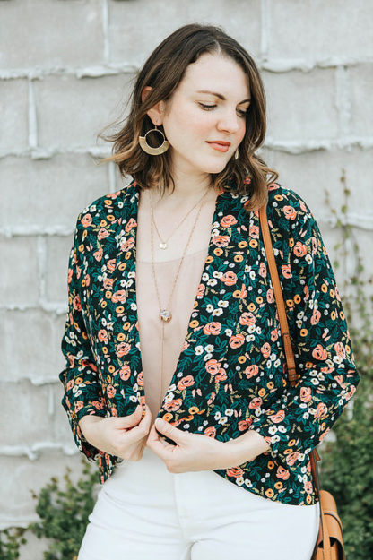Woman wearing the Bespoke Blazer sewing pattern from Sew To Grow on The Fold Line. A blazer pattern made in rayon, voile, lawn, chambray, or linen fabrics, featuring 3/4 sleeves, cascade collar, high low hem, and no closings.