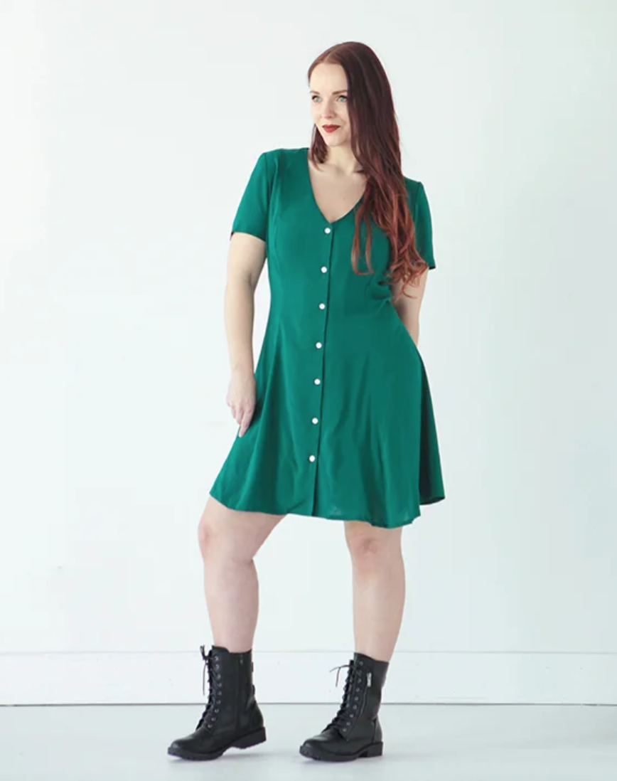 Woman wearing the Shelby Dress sewing pattern by True Bias. A dress pattern made in rayon challis, crepe, silk or linen fabric featuring princess seams, front button fastening, short sleeves and a V-shaped neckline.