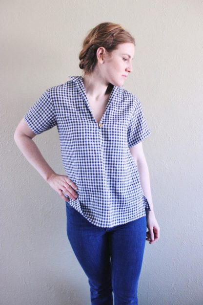 Woman wearing the Heidi Pullover Top sewing pattern by Anna Allen. A top pattern made in light or medium weight wovens such as cotton, linen or silk fabrics, featuring side slits, short sleeves, V-neck and button and thread closure.