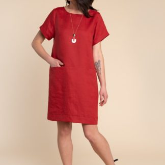 Woman wearing the Cielo Dress sewing pattern by Closet Core Patterns. A shift dress pattern made in linen, chambray, or cotton shirtings fabric featuring sleek inseam pockets and slightly dropped shoulders.
