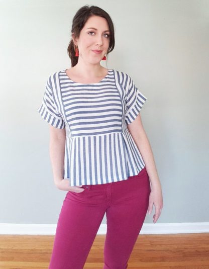 Women wearing the Fern Top sewing pattern from Pattern Scout on The Fold Line. A top pattern made in light to mid-weight woven fabrics, featuring a boxy silhouette, dolman-style short sleeves with cuffs and a sectioned bodice with a pleated peplum skirt.