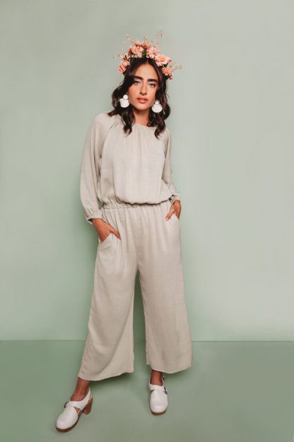 Women wearing the Avenir Jumpsuit sewing pattern by The Assembly Line. A jumpsuit pattern made in knit or woven fabrics featuring billowy sleeves and wide legs, elastic gathers at the neck, wrist and waist.