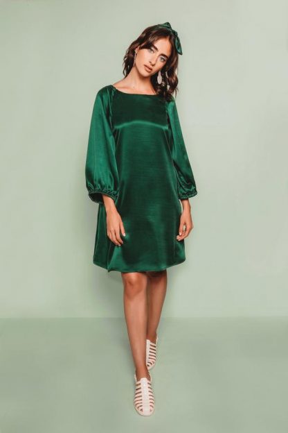 Woman wearing the Adrianna Dress sewing pattern by Friday Pattern Company. An A-line, pull on, dress pattern made in silk, rayon, linen or cotton fabric featuring large statement sleeves and high neckline.