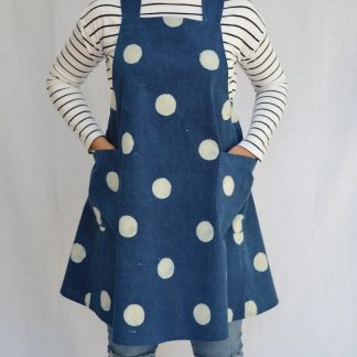 Women wearing the Maria Wrap Apron sewing pattern from Maven Patterns on The Fold Line. An apron pattern made in denims, chambrays or linen fabrics, featuring a wrap style back, cross over straps and two large patch pockets.