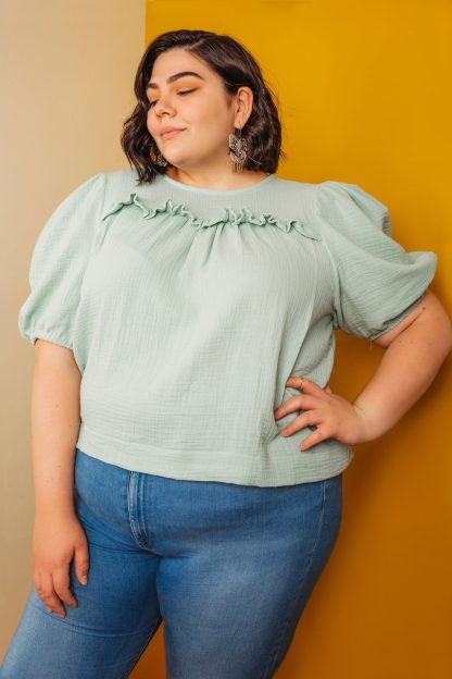 Woman wearing the Sagebrush Top sewing pattern by Friday Pattern Company. A relaxed fitting blouse pattern made in cotton, rayon challis, linen or silk fabrics featuring a round neck, generous puff sleeves and a gathered front.
